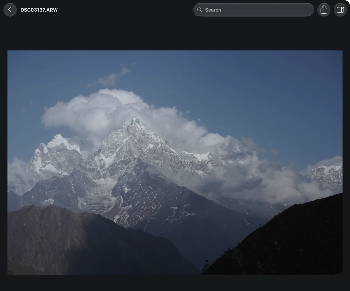 A mountain photograph enlarged in Grain Photo, with its filename and the back-to-gallery arrow above it